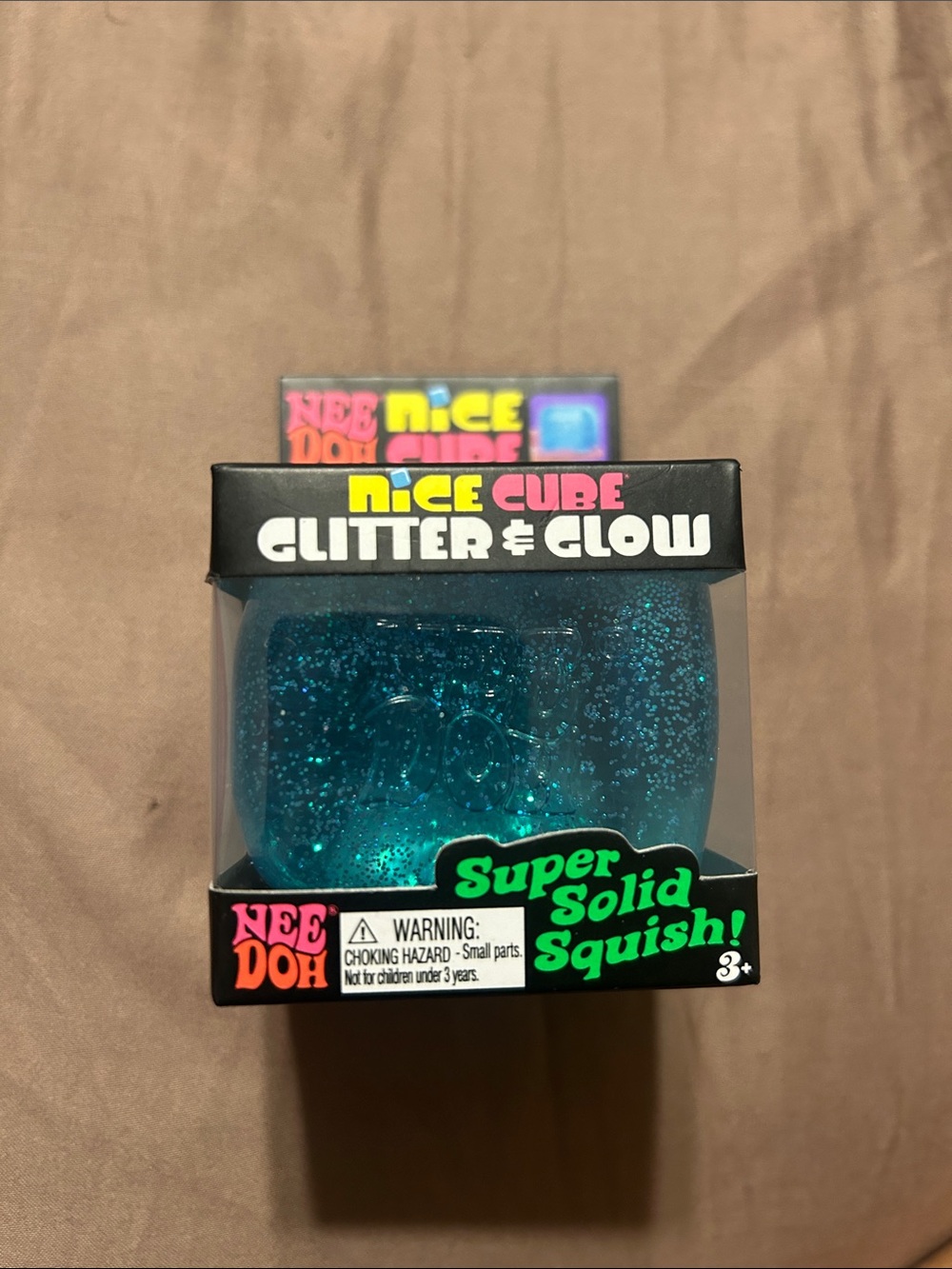 New Nice Cube Glitter & Glow Super Solid Squish - Blue ()